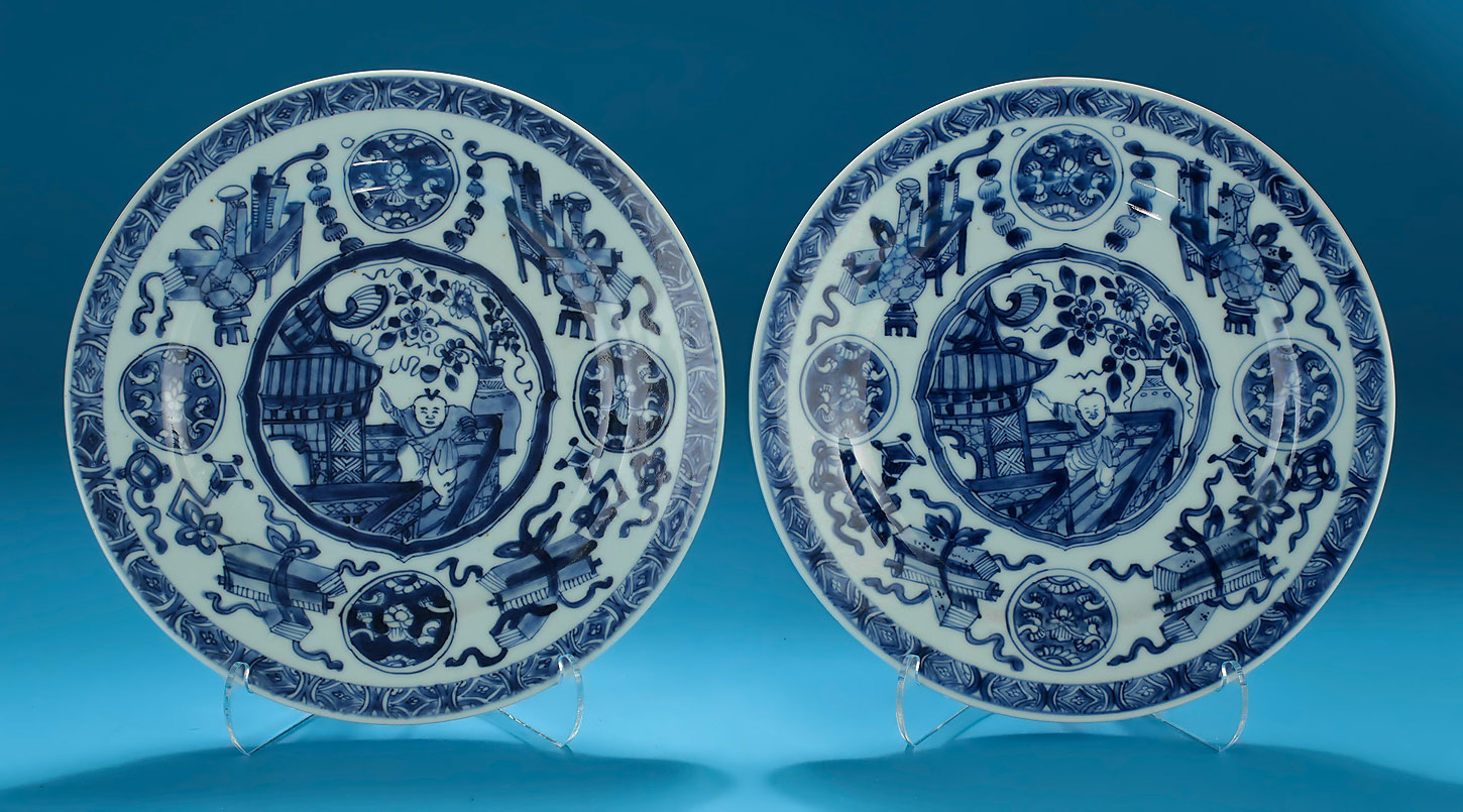 Pair of Kangxi Blue and White Porcelain Plates, decorated with a Dancing Boy on a veranda, 8.75" Diameter