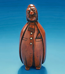Delightful Carved Coquilla Nut Snuff Box, formed as a man with a cape and cap, France c1790
