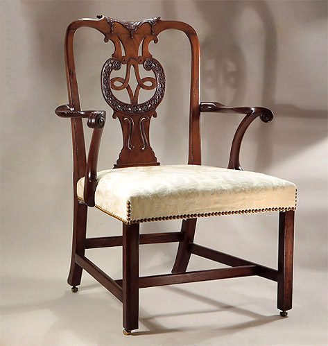 An Early George III Scottish Carved Mahogany Open Armchair
