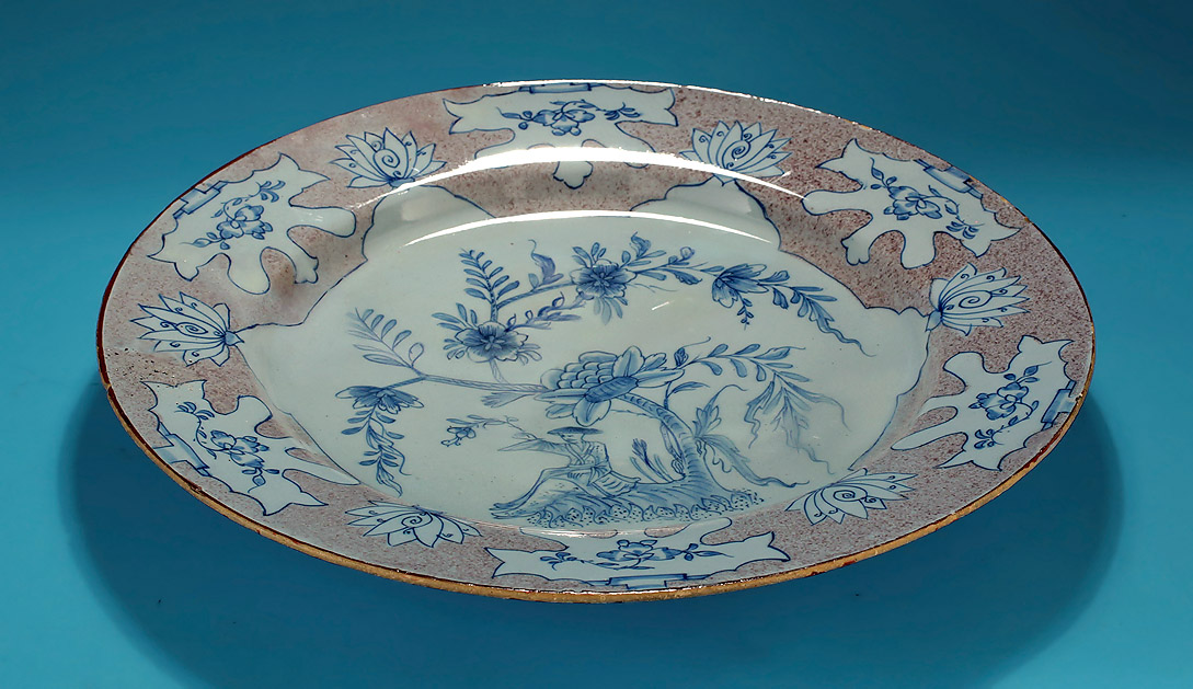  ENGLISH DELFT MANGANESE & BLUE “WOOLSACK" CHARGER, probably Liverpool, c1745-55, profile showing good condition of the rim