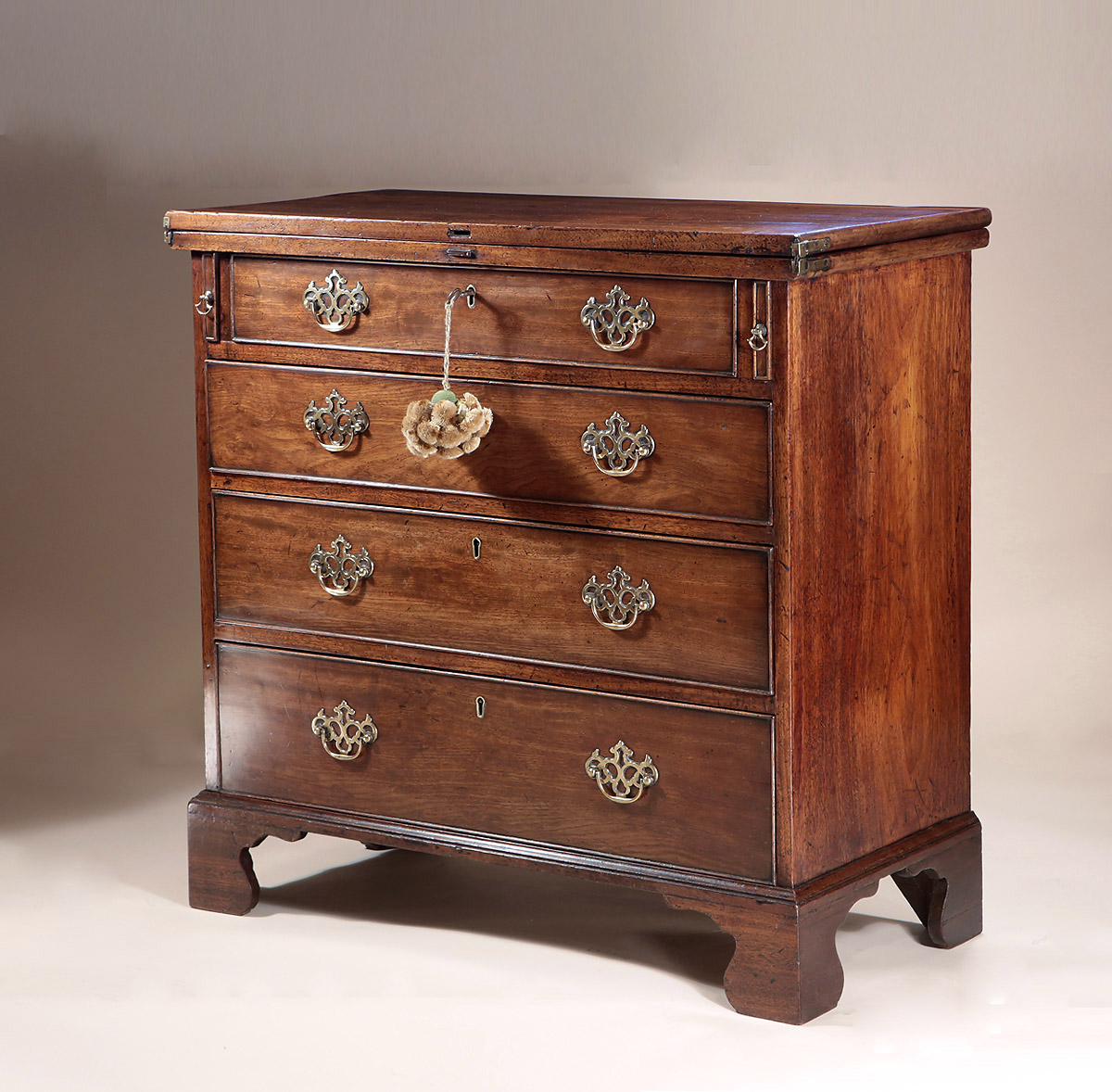 George II Cuban Mahogany Bachelor's Chest, with original surfaces and pierced brasses, England, c1745