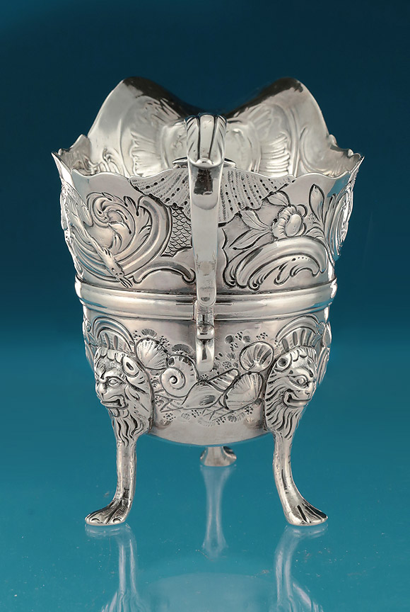 George II Irish Silver Embossed Helmet Cream Jug; Ireland, c1745-55, Marks Rubbed 