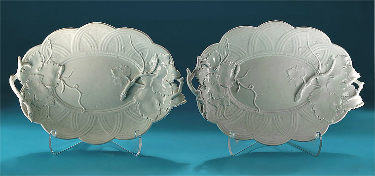  Pair of Chelsea White Leaf & Basket-Moulded Stands, England, 1752-54