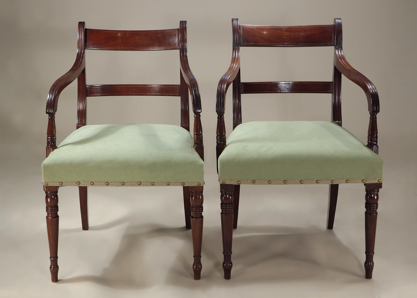 Set of 6 Late Georgian Inlaid Mahogany Sidechairs, showing the slight variance between the two armchairs