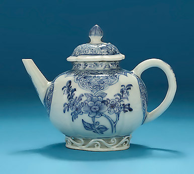 Rare Diminutive Yongzhend Blue & White Lotus-Moulded Teapot, China ,1723-35, with outset scrollwork to the base