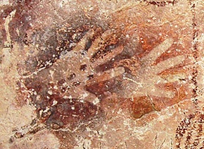 Hand stencils from cave painting in Gua Tewet, Kalimantan, Indonesia